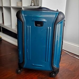 Tumi hard shell carry on luggage